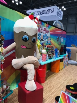 A huge soda Whiffer Sniffers mascot at Thai NY Toy Fair booth.