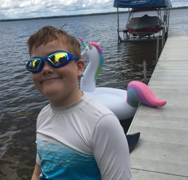 River in his cool shades on Lake Mitchell, MI